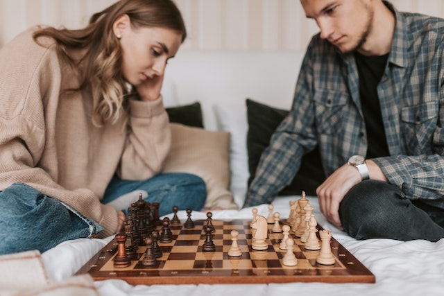 couple playing chess